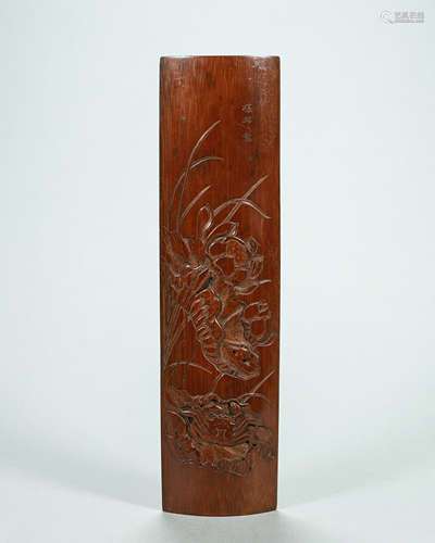 A lotus pond carved bamboo arm rest