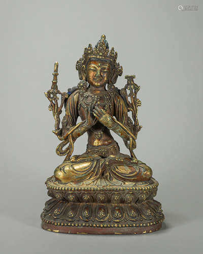 A gilding copper buddha statue