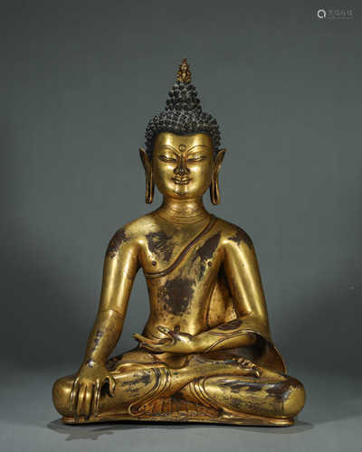 A gilding copper Sakyamuni buddha statue