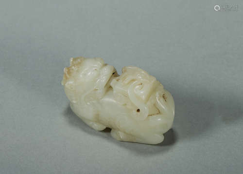 A Hetian jade qilin and book ornament