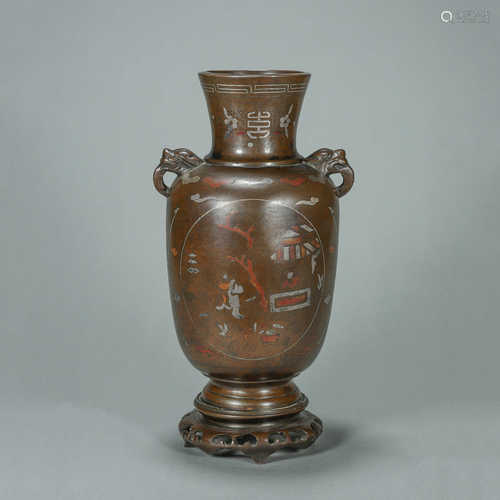 A figure patterned copper and silver vase with beast shaped ...