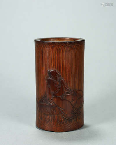 A figure carved bamboo brush pot