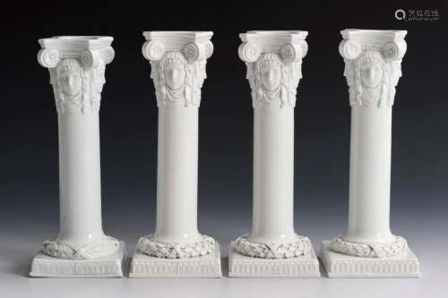 4 COLUMN CANDLESTICKS WITH MASCARONS. MEISSEN.