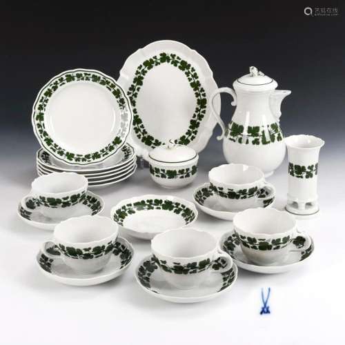 21 PIECES OF A COFFEE SERVICE WITH VINE LEAVES DECOR. MEISSE...