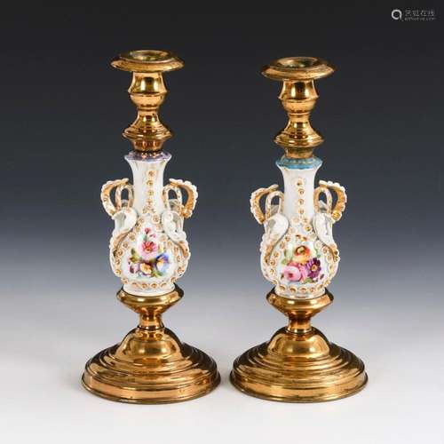 2 CANDLESTICKS WITH BRASS MOUNT.