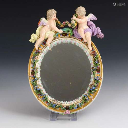 MIRROR WITH PAIR OF PUTTI. MEISSEN.