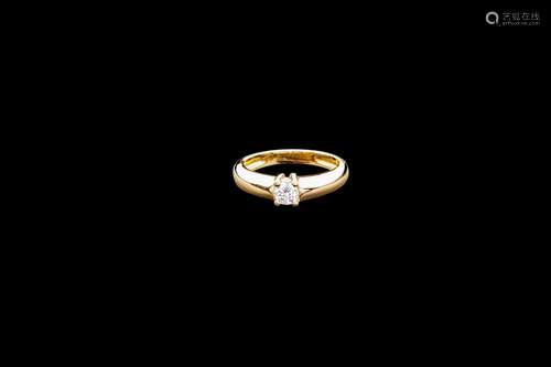 Bague en or jaune 18K (750°/00) sertie quatre griffes d'un d...