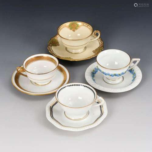 4 DIFFERENT DEMITASSE CUPS.