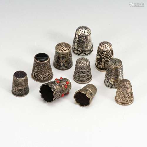 10 SILVER THIMBLES.