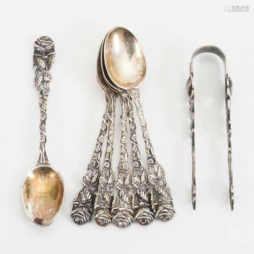 6 SILVER SPOONS AND 1 SUGAR TONGS IN CASE.