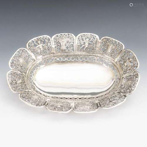 OVAL SILVER BOWL WITH BREAKTHROUGH RIM.