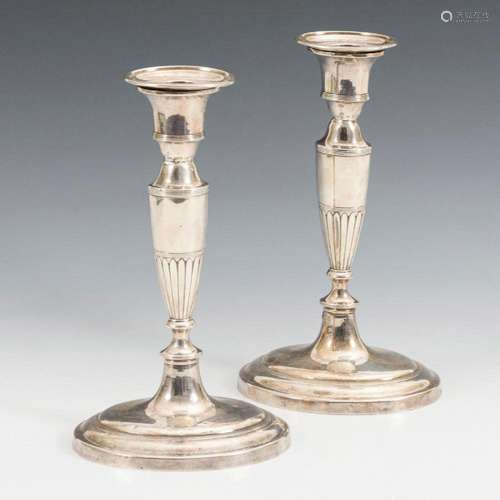 2 SILVER PLATED CANDLESTICKS.