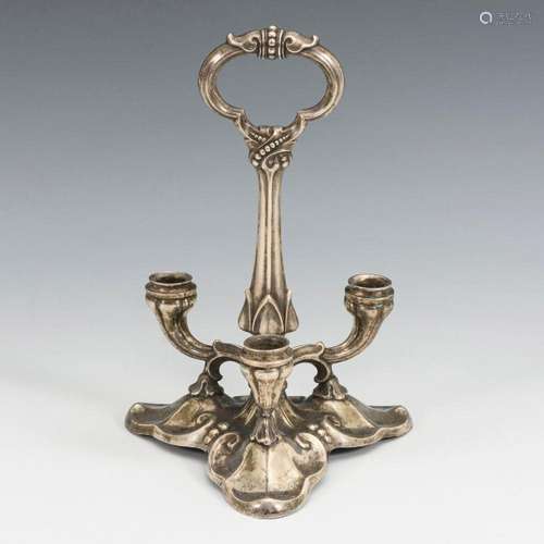 ART DECO HAND CANDLESTICK.