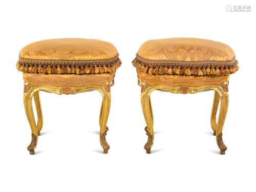 A Pair of Louis XV Giltwood Tabourets