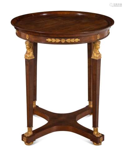 An Empire Style Parcel Gilt Mahogany Side Table