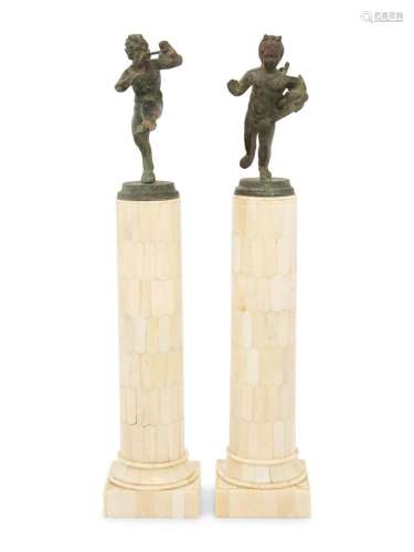 A Matched Pair of Bronze Figures on Resin Veneered Columns