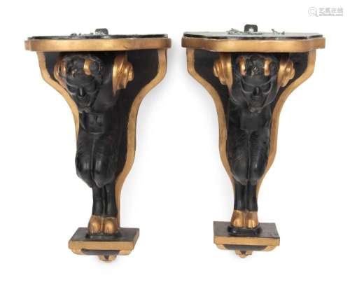 A Pair of Continental Ebonized and Parcel Gilt Wood Figural ...