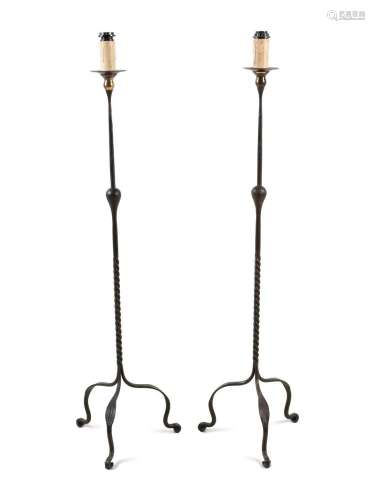 A Pair of Wrought Iron Floor Lamps