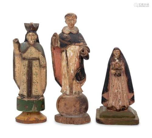 Three Carved and Polychrome Decorated Santos Figures