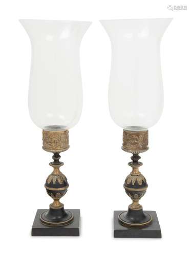 A Pair of Continental Metal Candlesticks