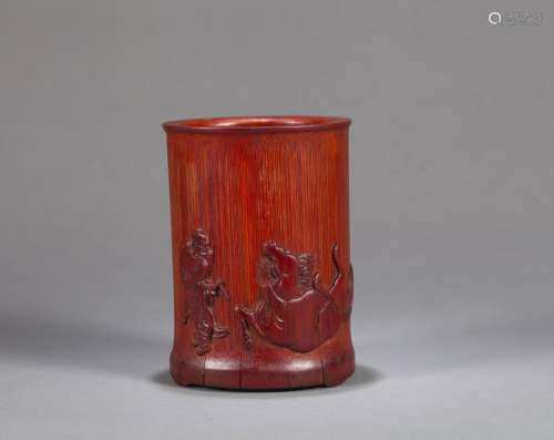 A horse carved bamboo brush pot