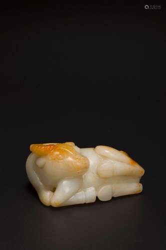 A white jade ox paperweight