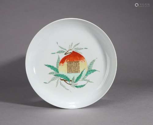 A multicolored bat and peach porcelain plate