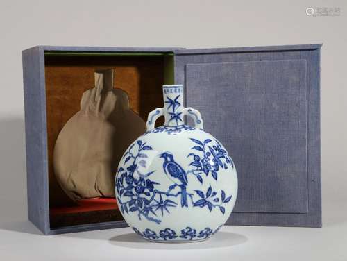 A blue and white bird and flower porcelain moon flask