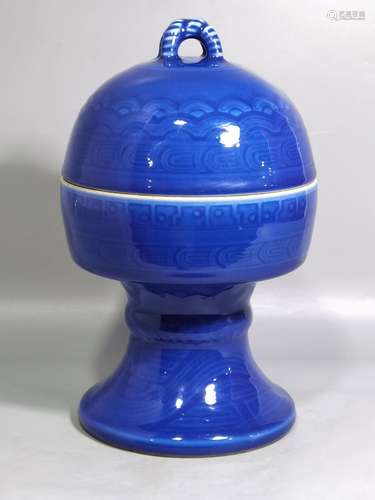 A blue glazed porcelain pot