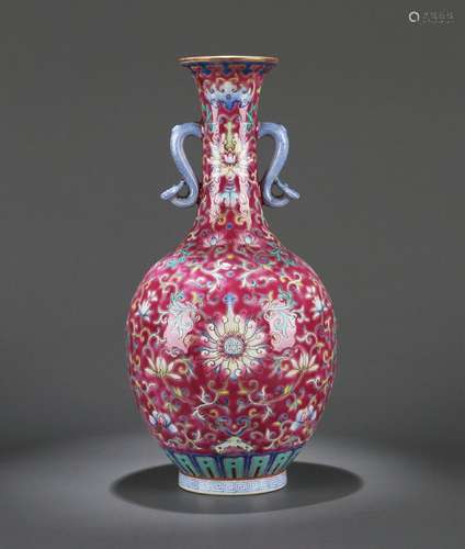 A red ground famille rose flower porcelain vase with ruyi sh...