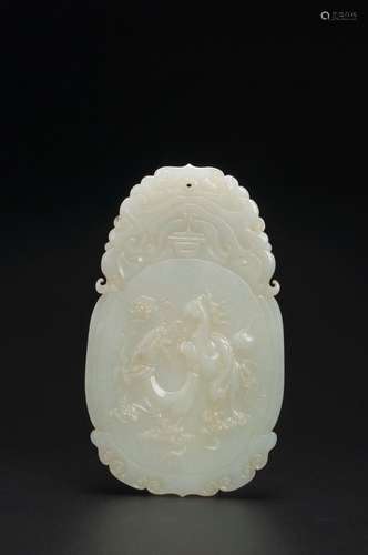 A dragon and phoenix white jade pendant