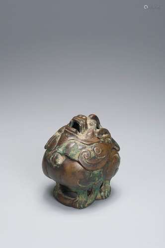 A copper incense burner