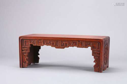 A chi dragon carved fragrant rosewood table