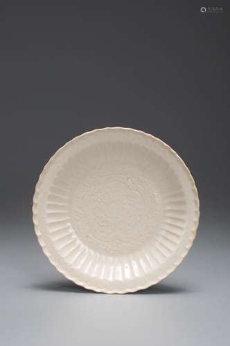 A flower carved white glazed porcelain plate