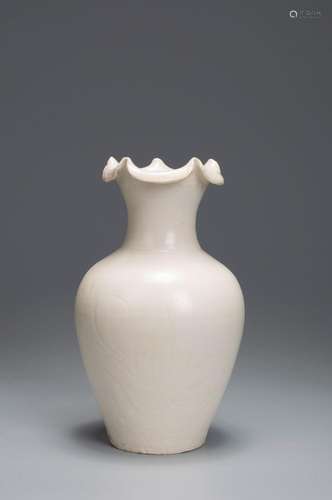 A flower carved white glazed porcelain jar