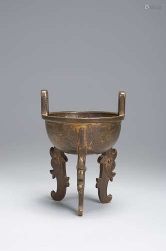 A three-legged double-eared gilt copper censer