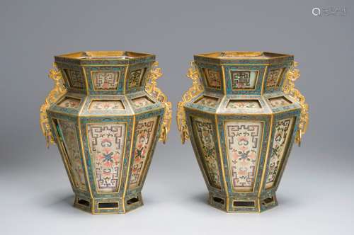 A pair of glass-inlaid cloisonne painted hexagonal vases