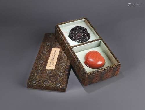 A red sandalwood peach shaped box