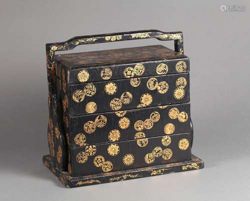 A black lacquered flower patterned box