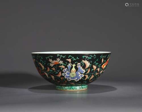 A black ground famille rose flower porcelain bowl