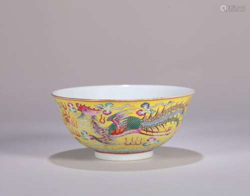 A yellow ground famille rose dragon and phoenix porcelain bo...