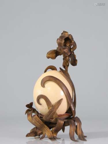 Bronze floral sculpture surrounded by an egg. Art Nouveau. S...