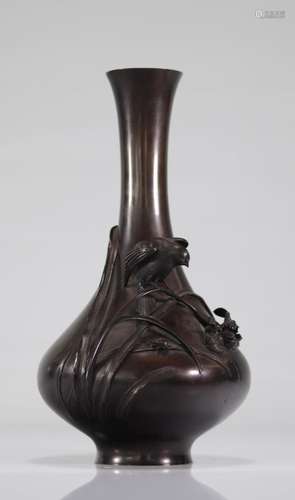 Japanese bronze vase decorated with birds and flowers. Artis...