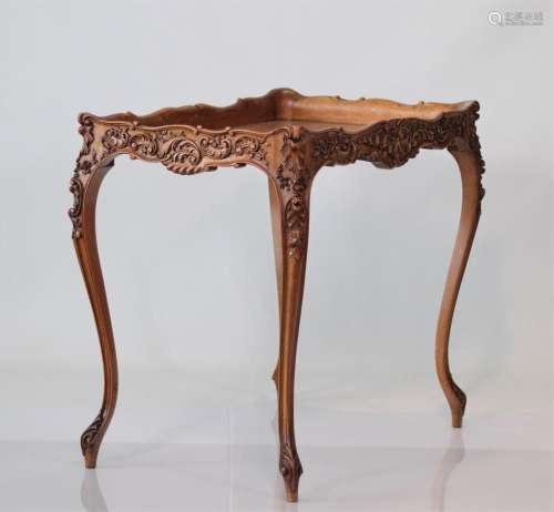 Deserted table in carved walnut from Liege