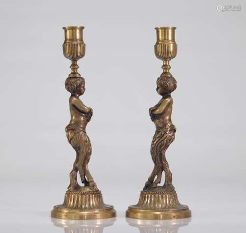 Pair of 2 bronze candlesticks decorated with fauna. Napoleon...