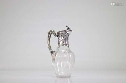 Crystal and silver decanter with floral decoration. XIX th c...