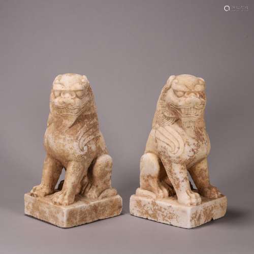 PAIR OF CHINESE WHITE STONE LIONS