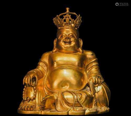 A sitting statue of Maitreya Buddha with bronze gilt in Qing...