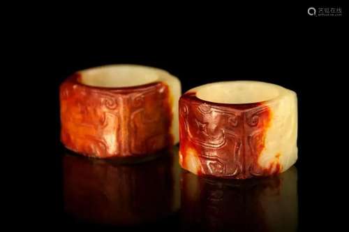 Pair of yellow jade rings with Qin, Ming dynasty