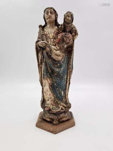 Vierge à l’enfant en terre cuite polychrome., Vers 1600., Ht...